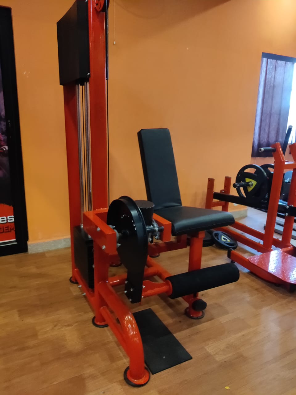 Seated leg curl with extension machine